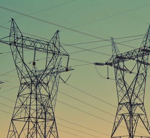 Transmission towers at dusk