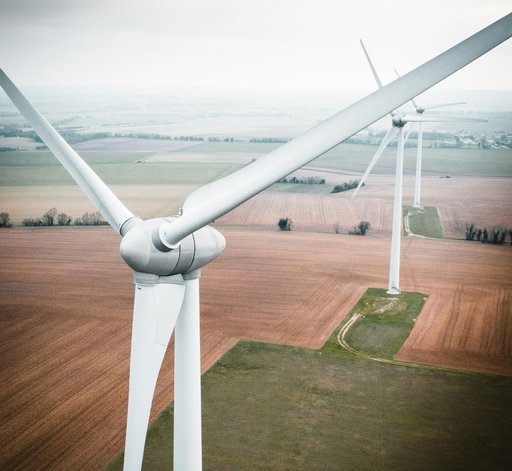Wind turbines over farmland